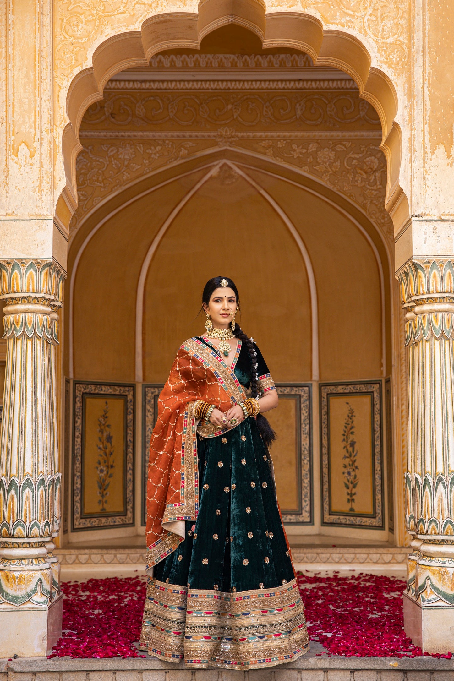 Pine Green And Carrot Orange Velvet Lehenga Set