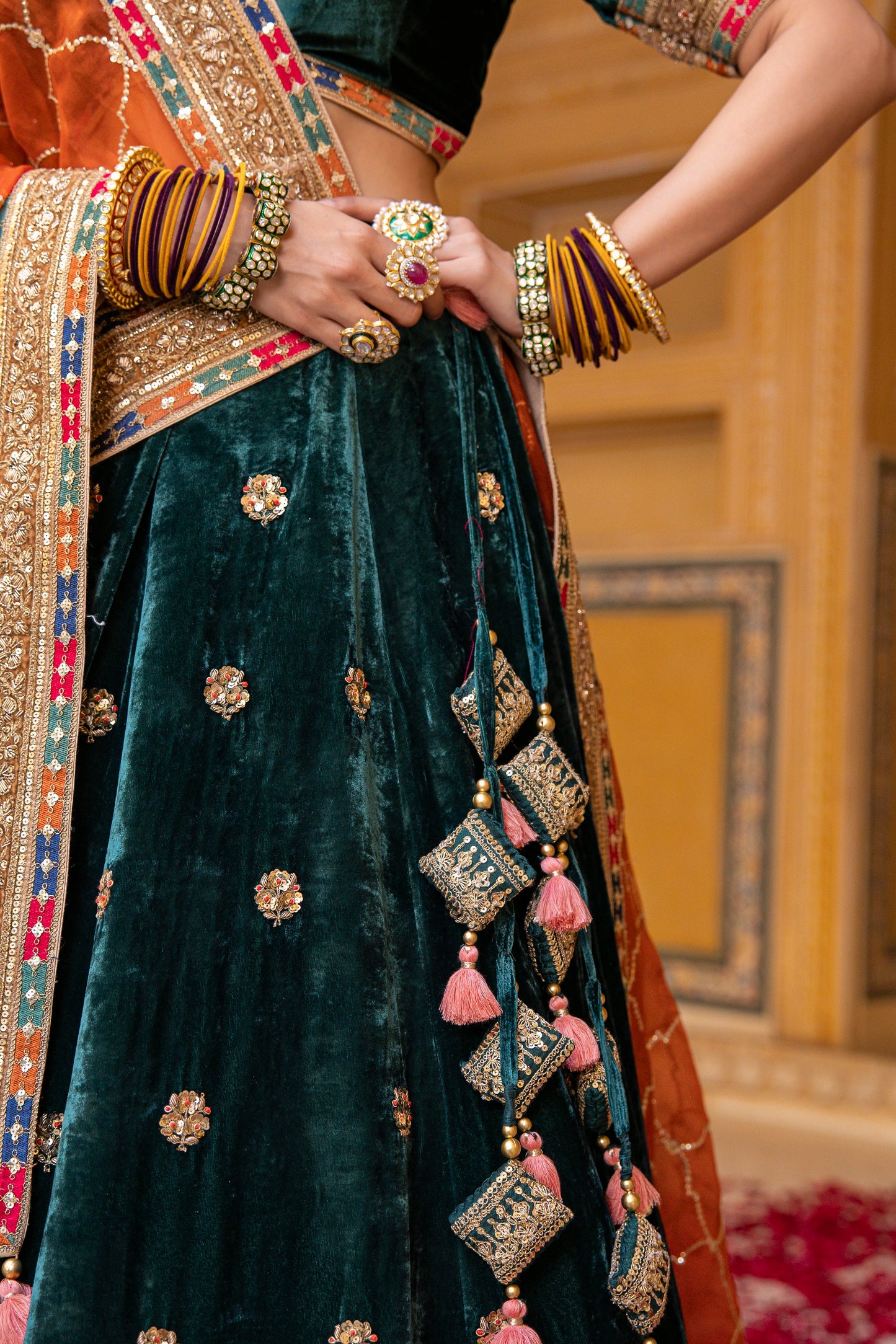 Pine Green And Carrot Orange Velvet Lehenga Set