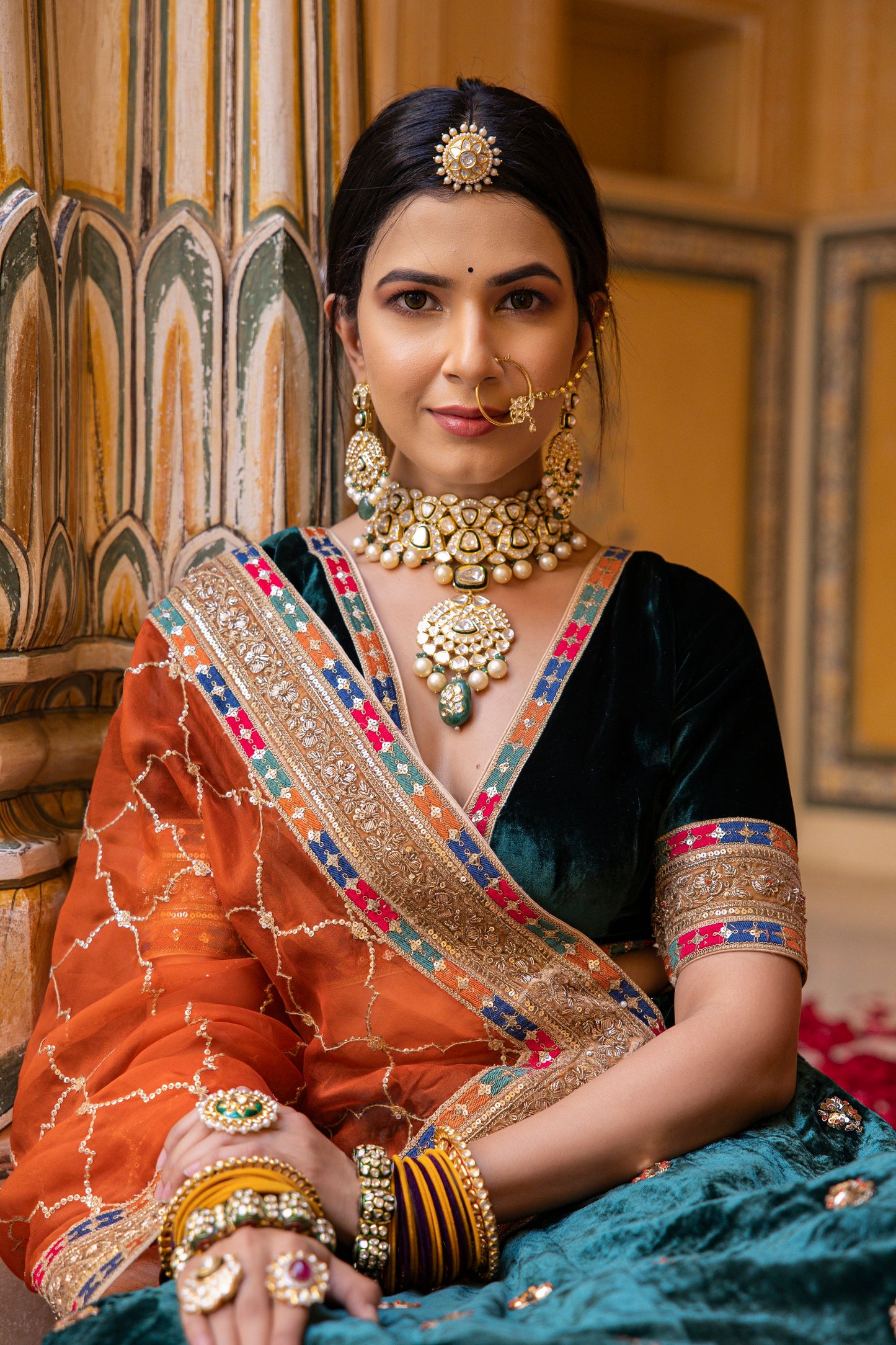 Pine Green And Carrot Orange Velvet Lehenga Set