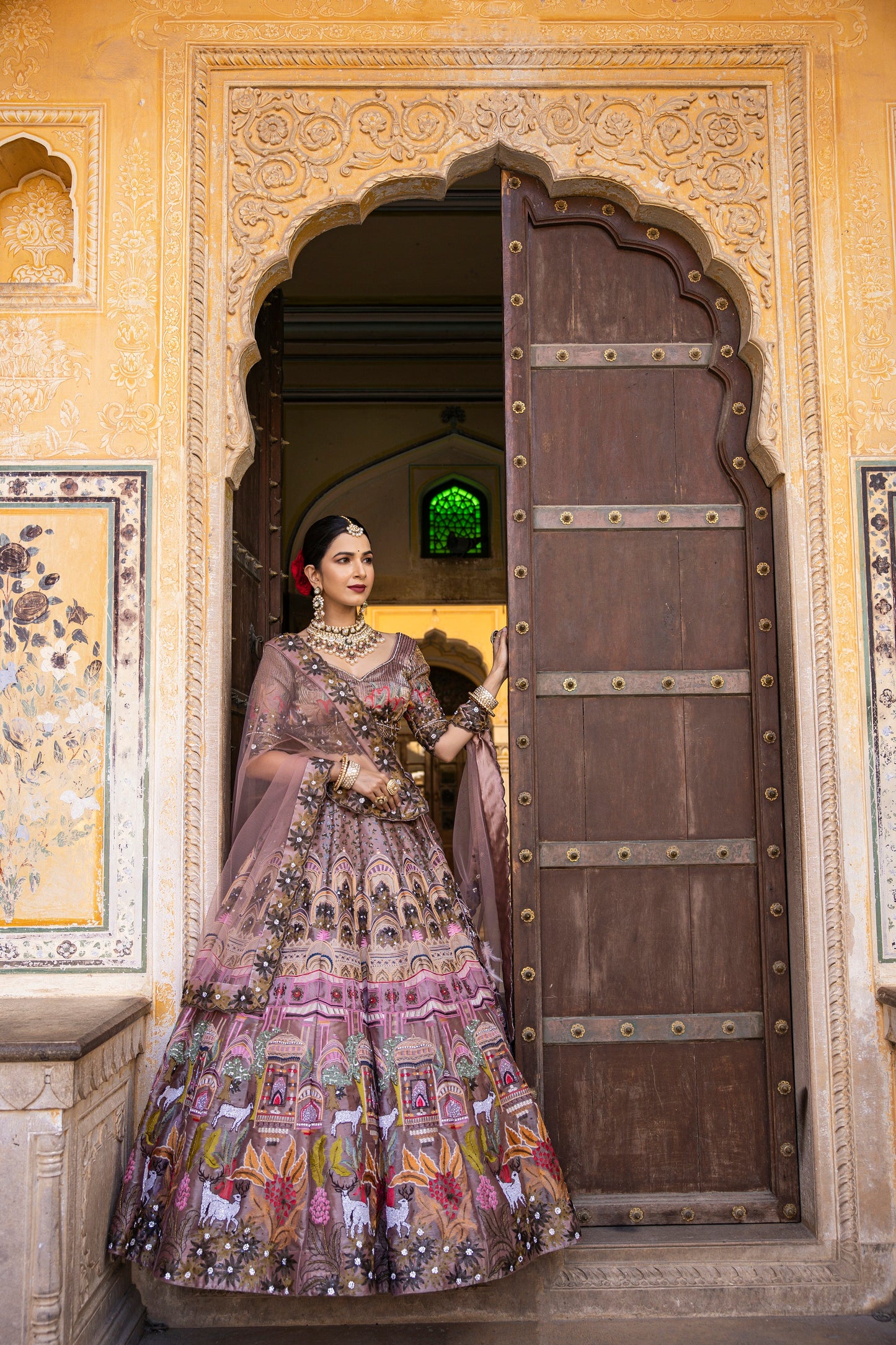 Mauve Shaded Lehenga Choli In Multi Color Thread Embroidery And Embellishment In Intricate Moroccan, Floral And Kalamkari Motifs