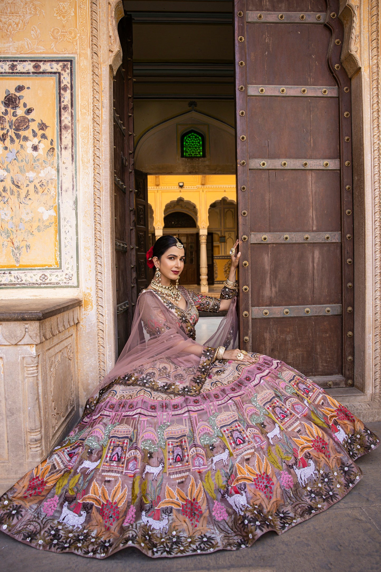 Mauve Shaded Lehenga Choli In Multi Color Thread Embroidery And Embellishment In Intricate Moroccan, Floral And Kalamkari Motifs