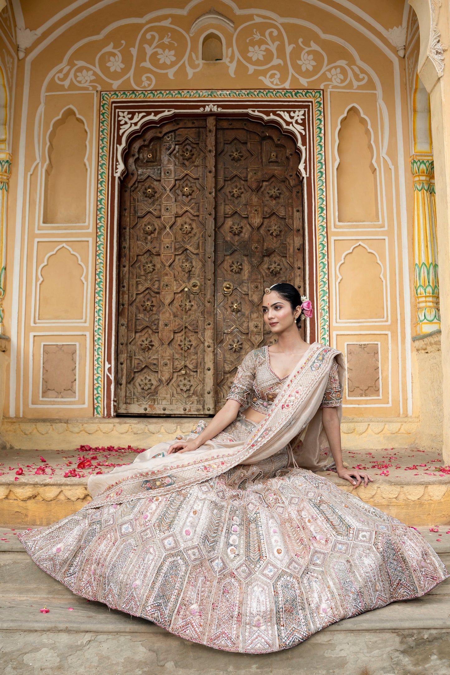 Beige Lehenga Choli In Multi Color Thread Embroidery And Embellishment In Intricate Geometric, And Floral Motifs