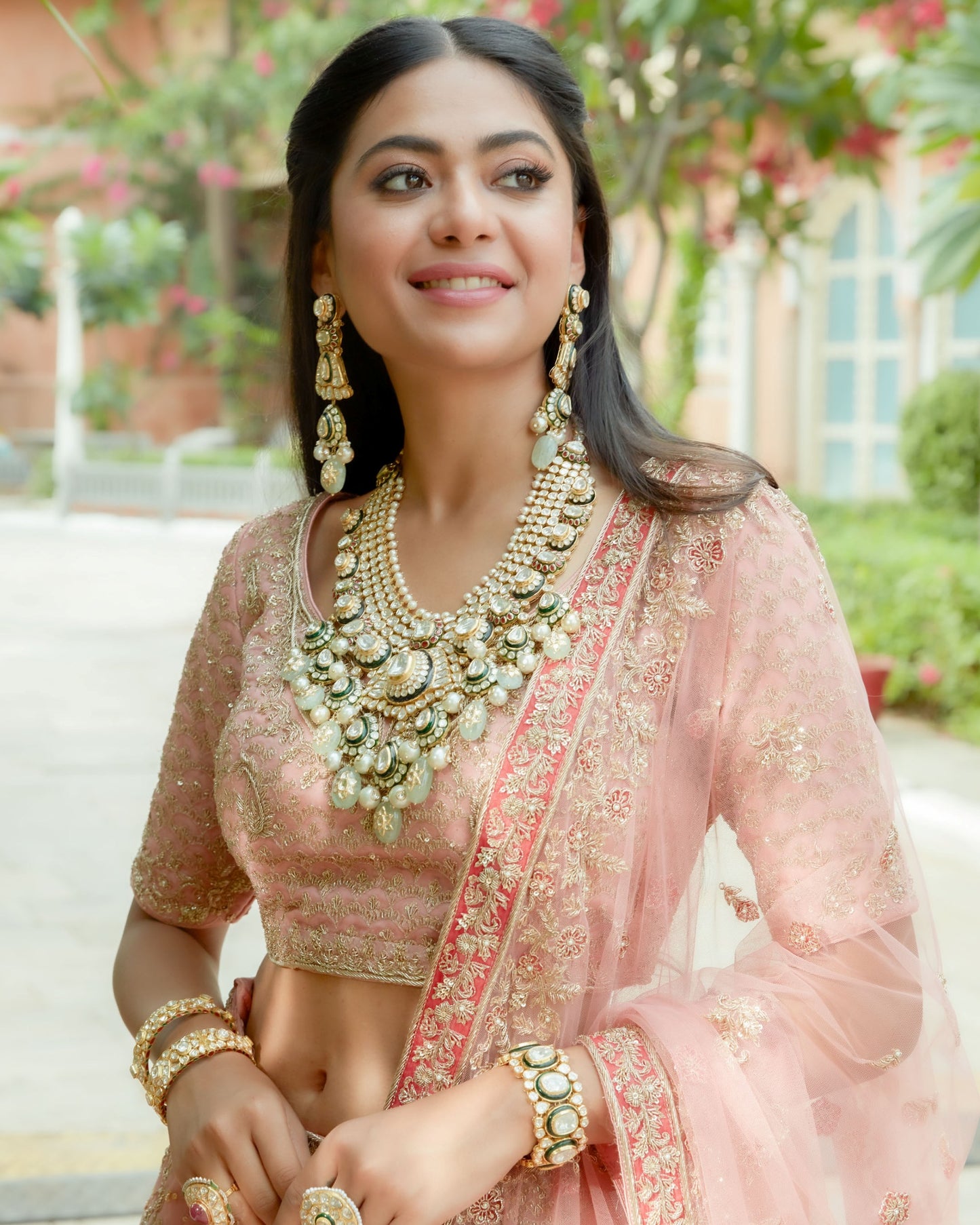 Rose Gold Organza Silk Heavily Embellished Lehenga Set In Floral And Peacock Jaal Work