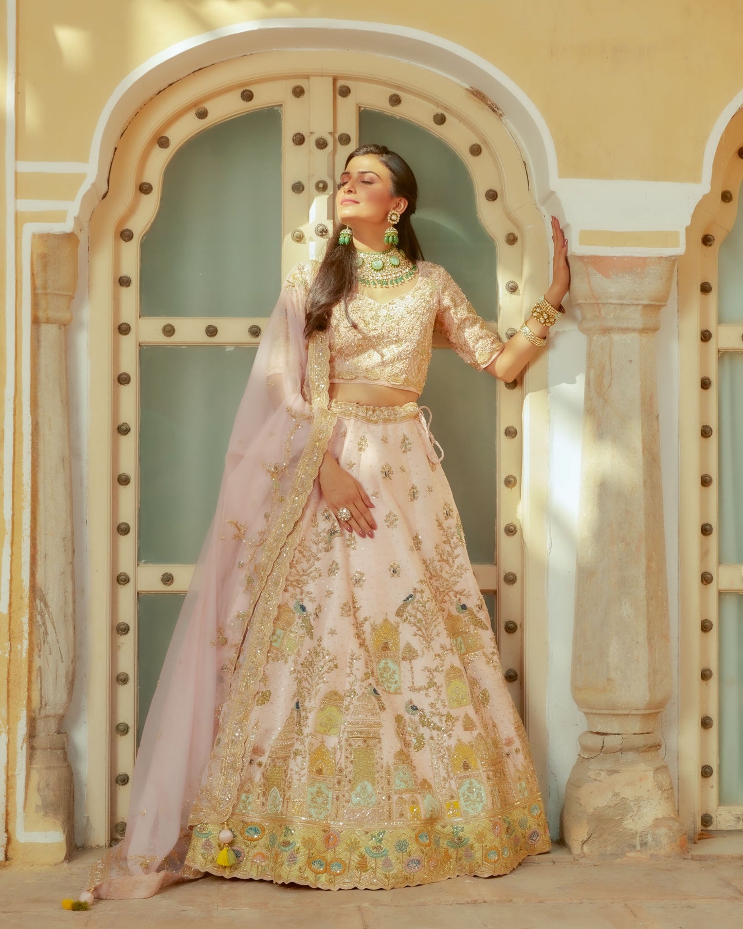 Pastel Pink Raw Silk Lehenga Having Royal Heritage Motifs In Zardozi Work With Choli And Dupatta