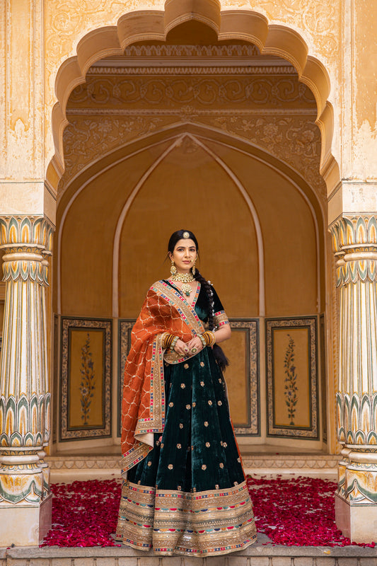 Pine Green And Carrot Orange Velvet Lehenga Set