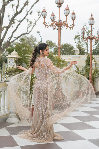 Beige Embellished Gown With Attached Cape