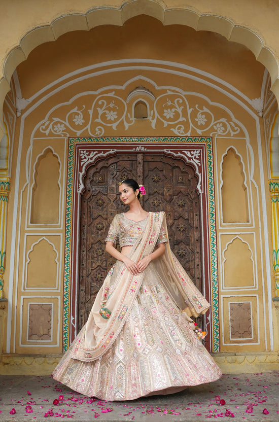 Beige Lehenga Choli In Multi Color Thread Embroidery And Embellishment In Intricate Geometric, And Floral Motifs