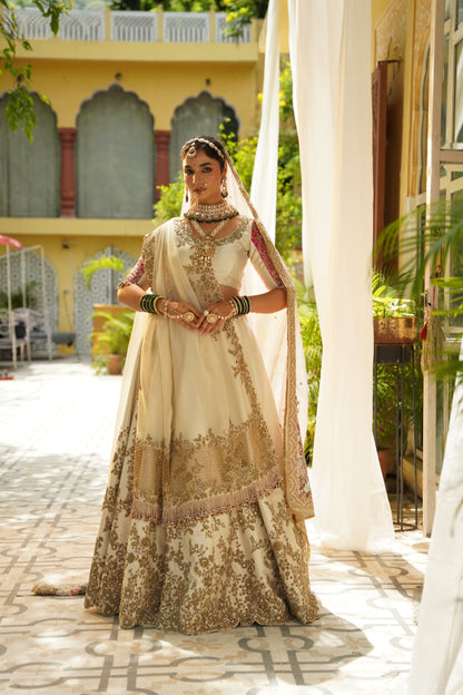 Cream and Rani Pink Embroidered Lehenga Set