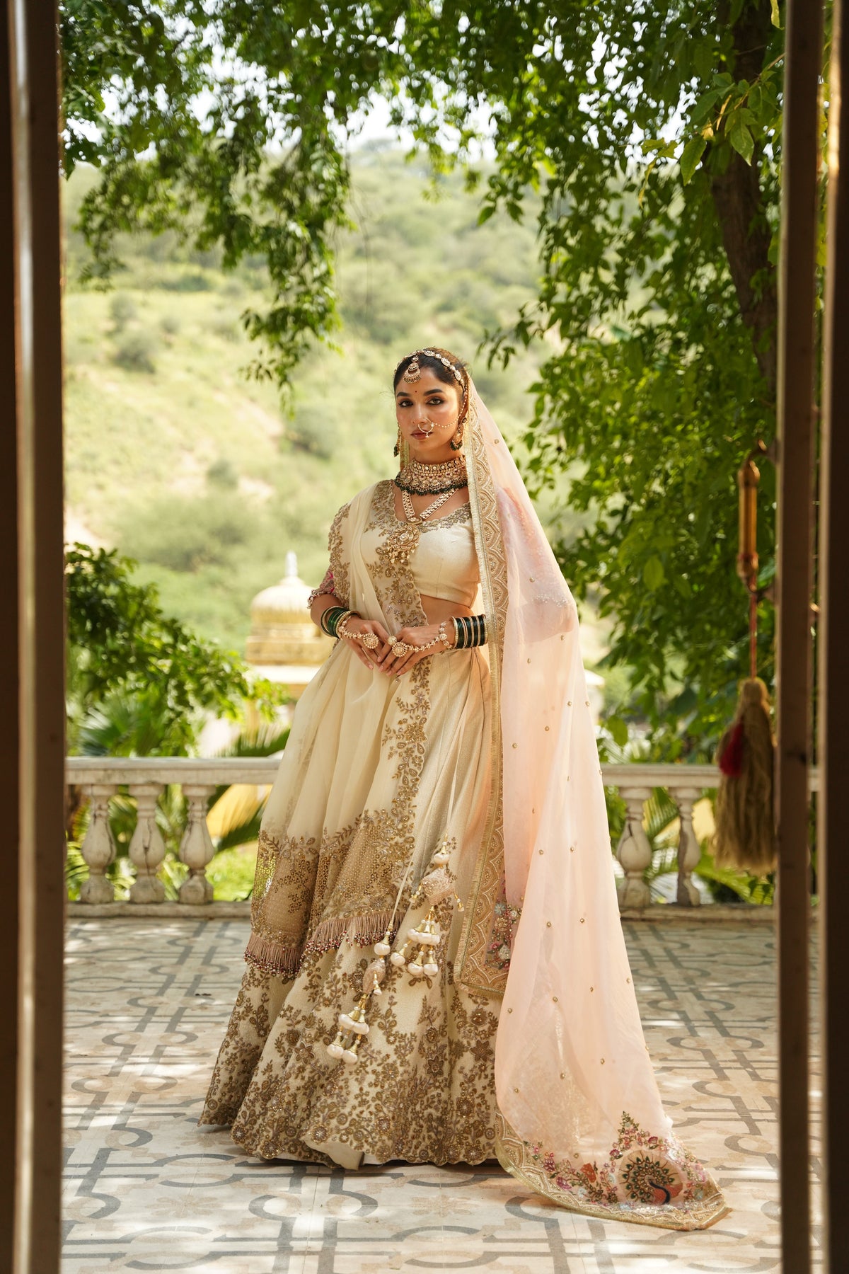 Cream and Rani Pink Embroidered Lehenga Set