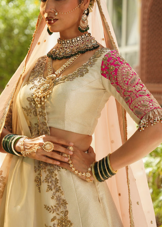Cream and Rani Pink Embroidered Lehenga Set