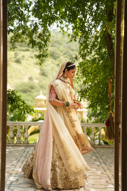 Cream and Rani Pink Embroidered Lehenga Set