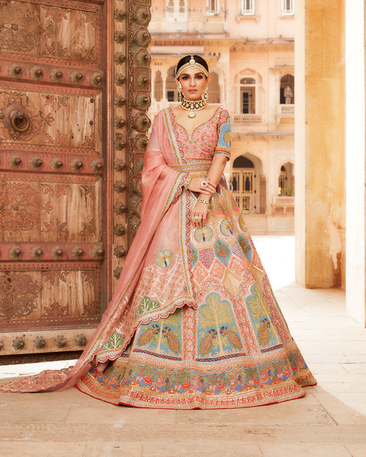 Soft Peach Raw Silk Lehenga Choli In Multi Color Thread Embroidery And Embellishment In Intricate Moroccan, Floral And Kalamkari Motifs