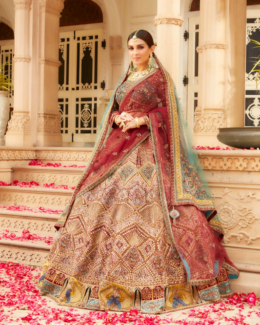 Maroon Soft Net Lehenga With Heavy Embroidery Of Tube, Sequin, Resham, Zari And Moti