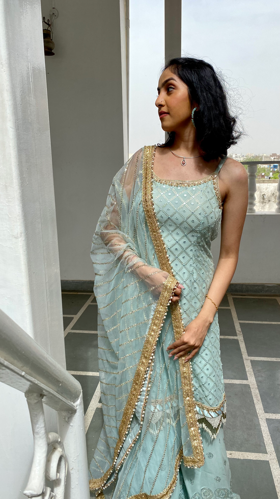 women sharara set  peplum sharara set  kurti sharara dupatta set  kurta sharara set with dupatta  sharara kurti set  sharara kurta set  kurti sharara set  sharara set for women  embroidered kurta with sharara  short kurta and sharara set  blue yellow sharara set  sharara and blouse set  kurta with sharara & dupatta  peplum top and sharara set  embroidered sharara set  Sharara Sets  New Arrivals to Complete your Wardrobe Ess